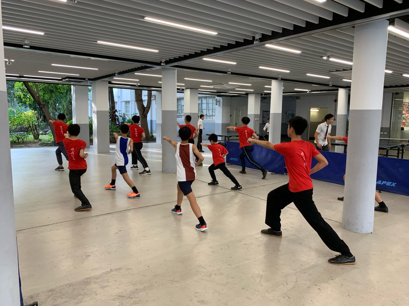 Students practising foundational Kung Fu together